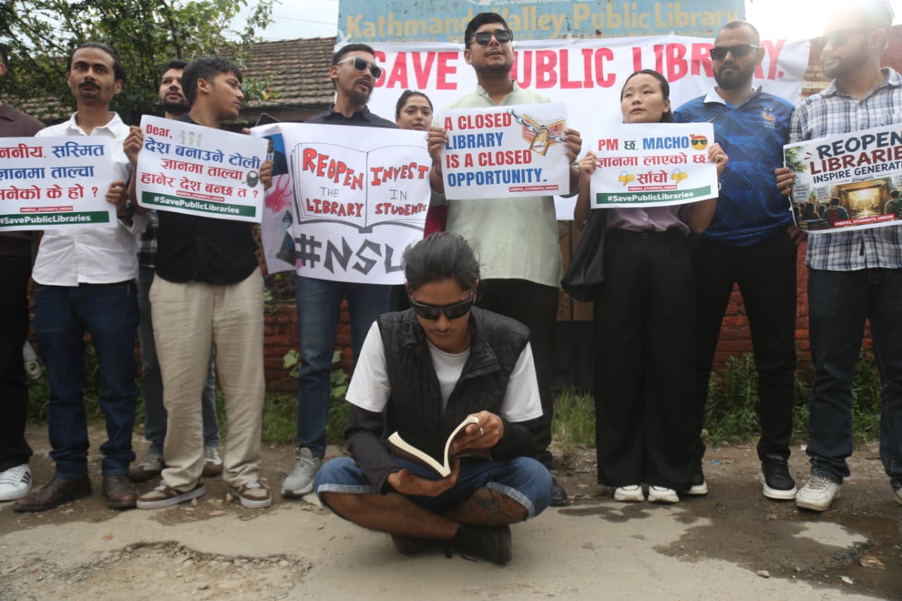 protest-against-public-library-closed (7).jpeg